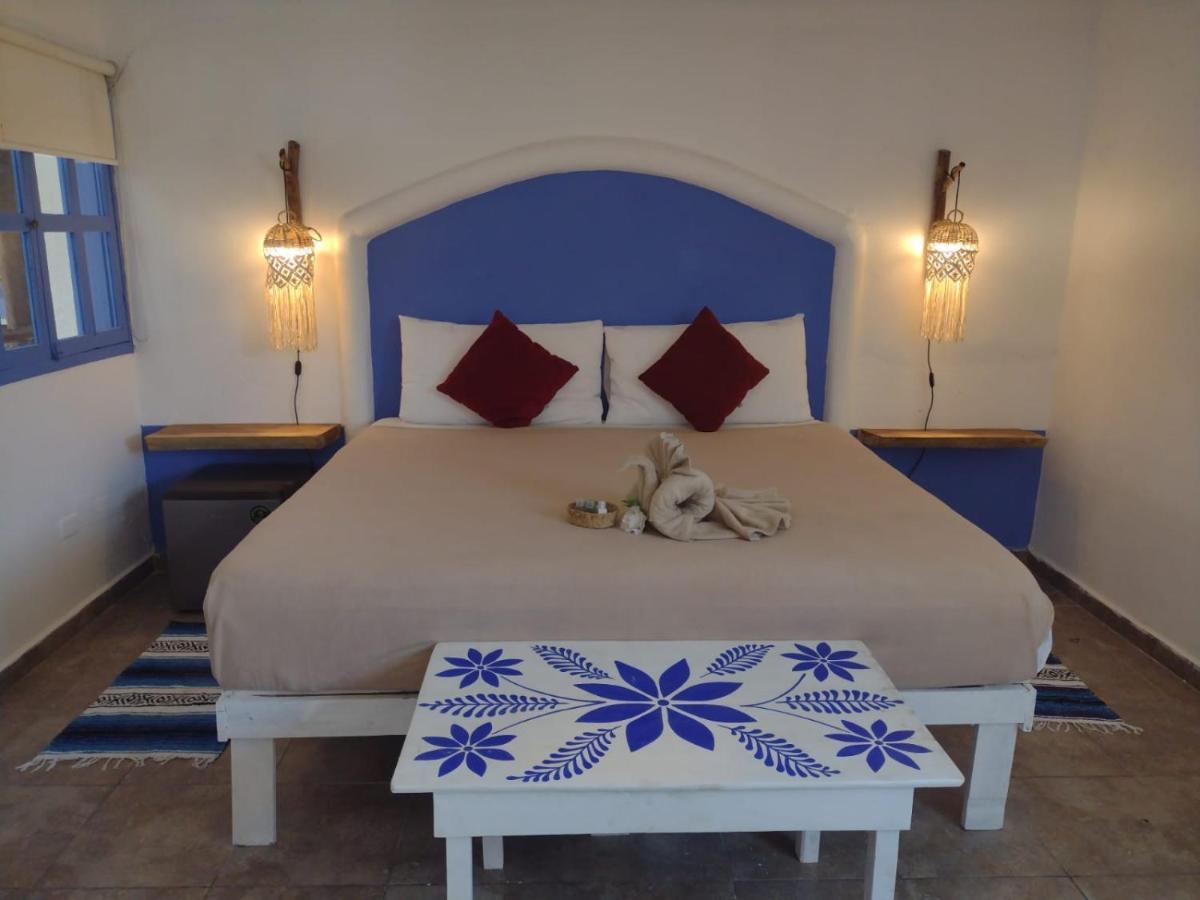 Mio Tulum Hotel Boutique Εξωτερικό φωτογραφία A bedroom in a hotel in Santorini, Greece