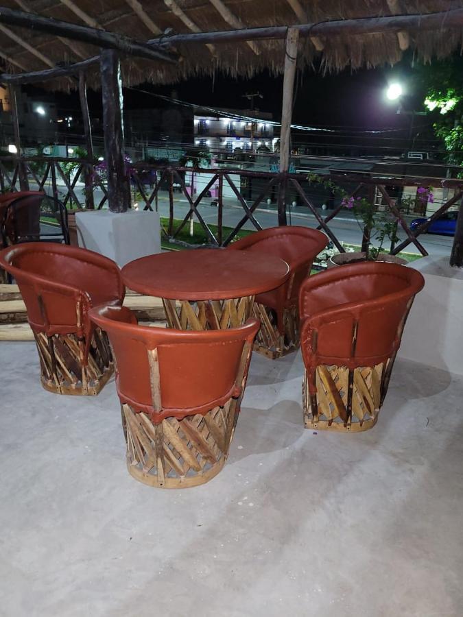 Mio Tulum Hotel Boutique Εξωτερικό φωτογραφία A set of equipales