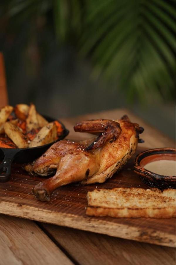 Mio Tulum Hotel Boutique Εξωτερικό φωτογραφία A half chicken